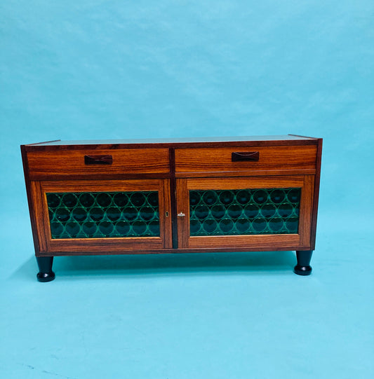 Swedish mid-century  rosewood credenza with glass bottle doors