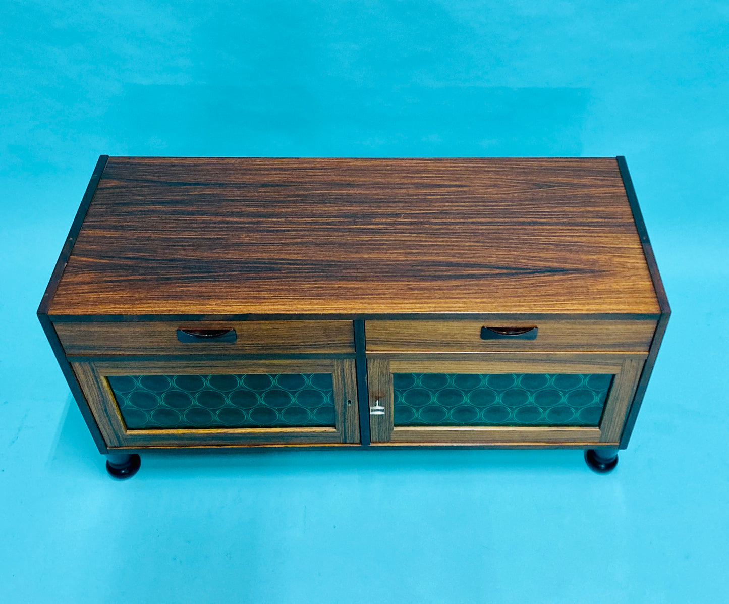 Swedish mid-century  rosewood credenza with glass bottle doors