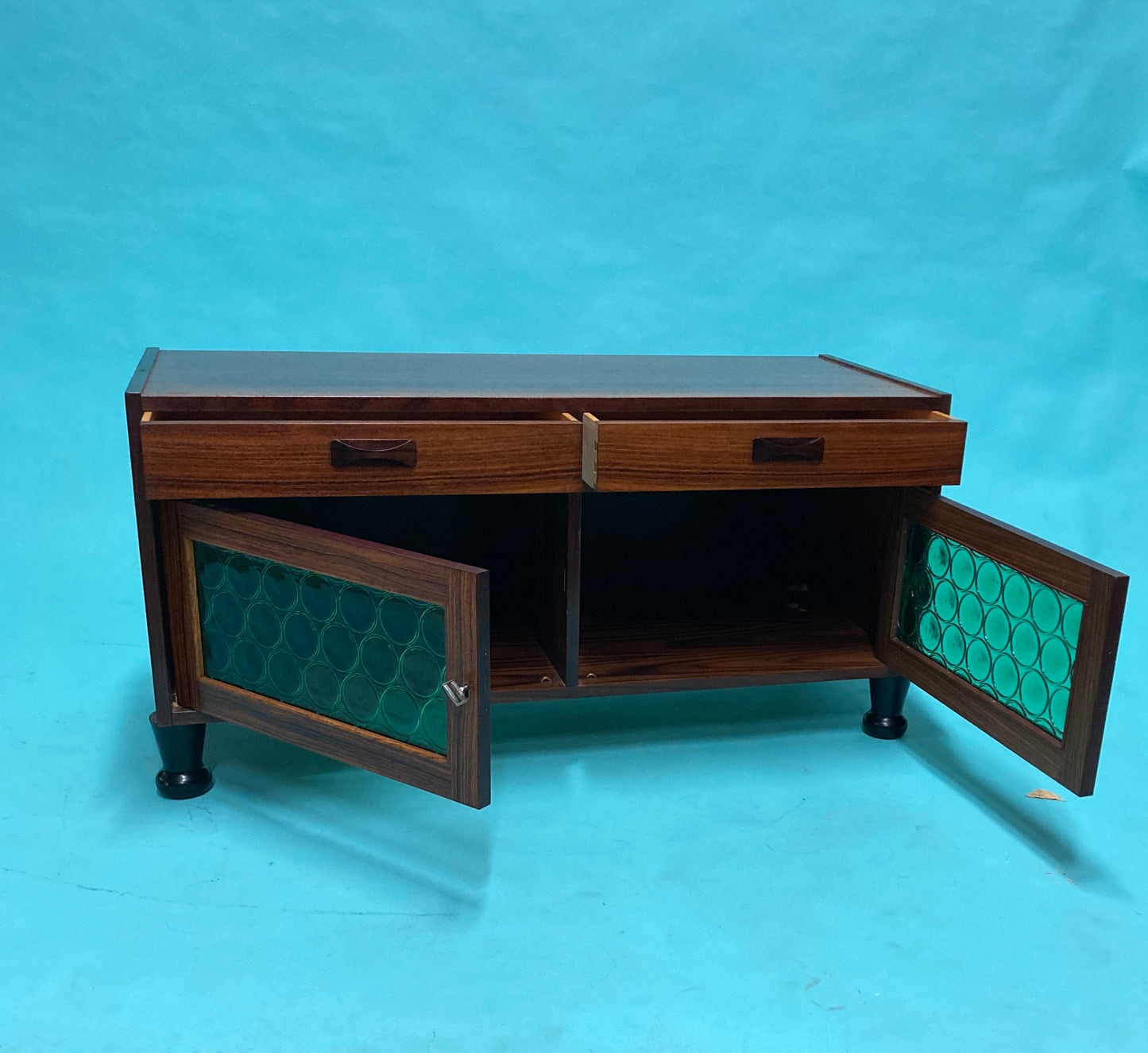 Swedish mid-century  rosewood credenza with glass bottle doors